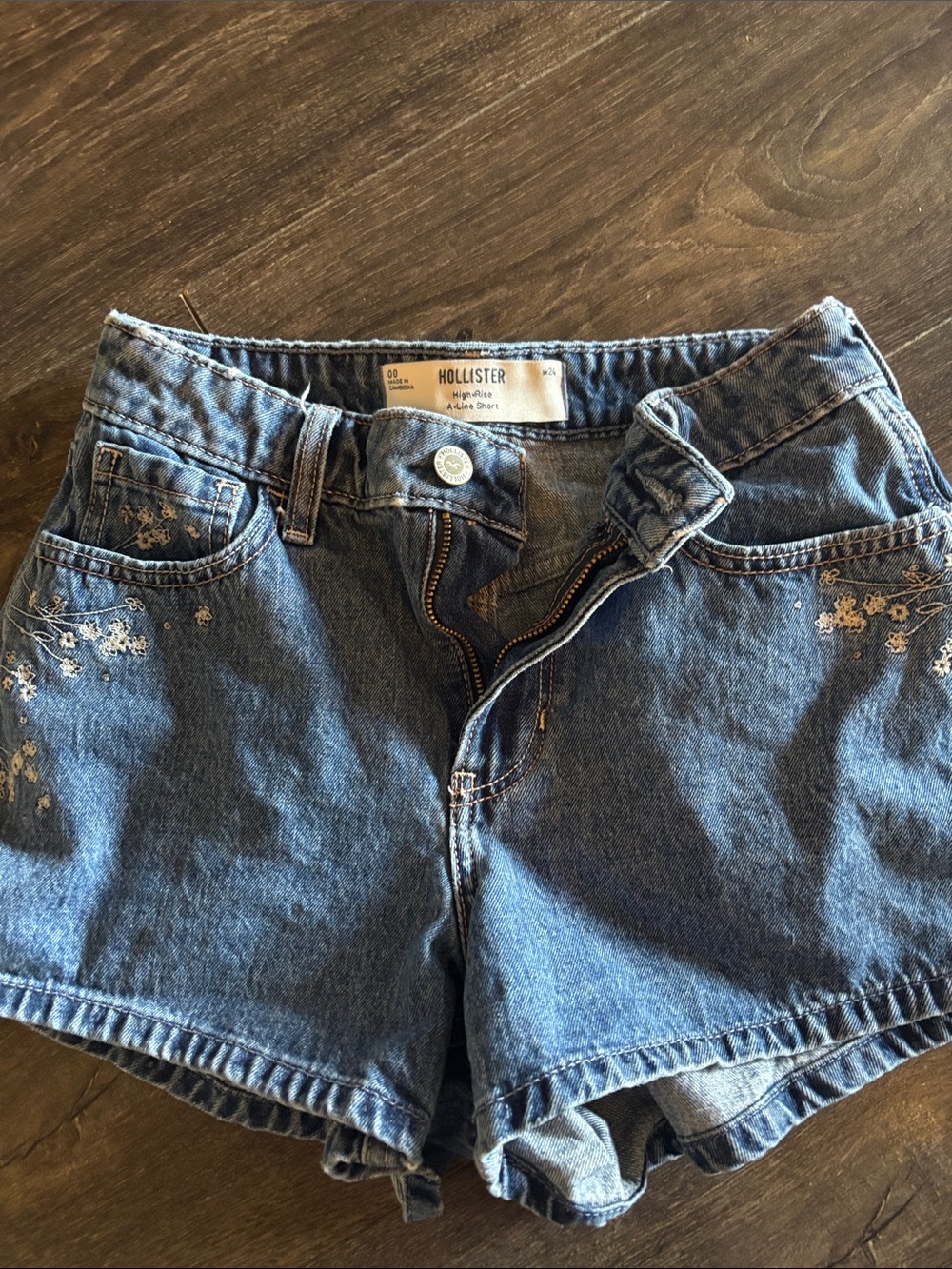 Hollister Mid-Blue Denim Shorts with Embroidered Flowers